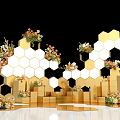 Golden Hexagonal Wedding Decoration Setup With Warm Toned Floral Arrangements And Platforms