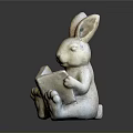 Rabbit Sculpture Holding a Book in Reading Position as Decorative Art Piece