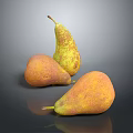 Three Yellow And Orange Speckled Pears On Black Smooth Surface With Reflections