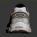 White Sports Shoes With Blue And Gold Stripes For Comfortable Athletic Wear