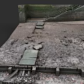 Metal Spiral Staircase in Stone Wall Setting With Dirt and Gravel Ground