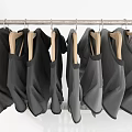 Row of Gray T-shirts Hanging On Wooden Hangers With Gradient Color From Dark To Light