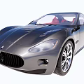Silver Gray Luxury Sports Car With Red Seats And Sleek Exterior Design
