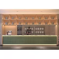 Warm Toned Restaurant Interior Featuring Wooden Decor Curved Design Booth Seating And Indoor Plants