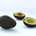 Fresh Whole and Halved Avocado With Pit on White Background