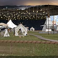 Beautiful Garden Landscape With Green Grassland White Tents Lighting Decorations And Distant Hills