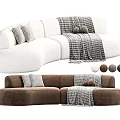Curved Sectional Multi Person Sofa In Brown Gray Plush Material With Decorative Pillows And Throw Blanket