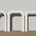 Three White Door Arches Against Wall With Wooden Floor Minimalist Design