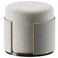 Light Gray Round Ottoman With Soft Fabric Upholstery And Gold Accents