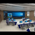 Modern Monitoring Room Interior With Control Console Ergonomic Chairs And Monitor Screens