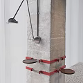 Concrete Column With Black Metal Fixtures Red Brackets And Circular Trays