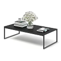 Black Modern Dining Table with Minimalist Design White Flower Bouquet Books and Small Cup