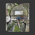 Rustic Hand Water Pump On Green Stone Well Platform With Mossy Weathered Ground