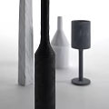 Ceramic Vessels with Various Shapes Black White Grey Colors and Textured Surfaces
