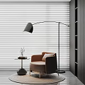 Modern Beige Single Sofa With Coffee Table Books Floor Lamp And White Blinds