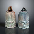 Antique Bronze Bells With Decorative Top Figures And Intricate Surface Patterns
