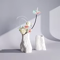 White Ceramic Vases With Wavy Texture Decorative Flowers Ornamental Hoops And Blooms In Grey Background