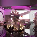 Fantasy Bar Interior with Purple Lighting Circular Decor Large Floral Sculpture and Reflective Floor