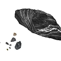 Large Textured Black Stone with Smaller Stones and Natural Wooden Blocks