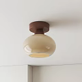 Modern Ceiling Light With Wooden Base And Beige Round Glass Shade Design