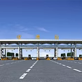 Large Toll Station Building With Multiple Lanes And Cars Under Clear Blue Sky