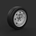 Car Wheel Featuring Black Rubber Tire And Silver Alloy Rim Design