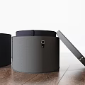Round Storage Stools in Black Navy Blue and Gray with Open Lid on Wooden Floor