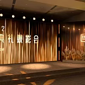 HLA Store Entrance Display With Golden Curtains String Lights And Plant Decorations