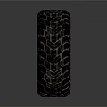 Black Off Road Tire With Deep Tread Pattern And Metal Rim Design