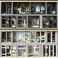 Casement Windows In Modern Multi Storey Building Exterior With Black White Frames And Green Trees