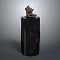 Stylish Brown Shoes Showcased On Black Cylindrical Display Stand With Modern Design