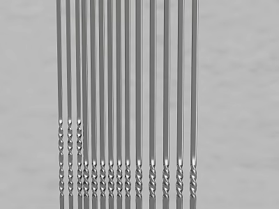 Silver Metal Cutlery Set Of Chopsticks With Spiral Design Neatly Arranged 3d model