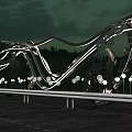 Modern Garden Landscape With Curved Metal Sculptures Green Lawn Pathway And Lighting