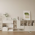 Modern White Bookcase With Storage Shelves Decorative Items Green Plants And Abstract Painting