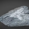 Natural Gray Stone With Textured Surface And Yellow Specks As Raw Decorative Material