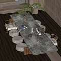 Modern Tea Table and Chairs with Marble Top Cushioned Stools and Potted Plant