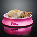 Cat Resting In Pink Bowl With Pinku Text On Reflective Surface