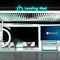 Leading Mod Exhibition Booth With Windows 11 Display Curved Design Tables Chairs And Plants