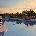 Christmas Amusement Park With Santa Claus Snowman Pool Castle Buildings Sunset Reindeer Sleigh