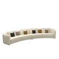 Curved White Sectional Sofa with Mixed Pillows and Round Coffee Tables in Modern Living Room