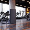 Modern Fitness Gym Interior Featuring Treadmills Ellipticals Strength Machines And Orange Accent Lighting
