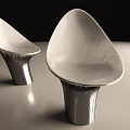 Modern Leisure Chair With Sculptural Curved Shape And Elegant Metallic Design