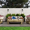Cozy Wooden Outdoor Sofa Set With Coffee Table Plants And Lanterns In Patio Garden