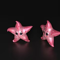 Two Adorable Pink Starfish Featuring White Spots And Smiling Faces On Black Shiny Surface