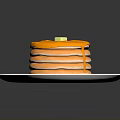 Stacked Pancakes on a White Plate Topped with Yellow Syrup and Butter