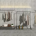 Metal Clothing Racks With Hanging Clothes And Dresses In Minimalist Store Interior