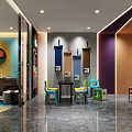 Vibrant Modern Exhibition Space With Colorful Walls Multicolored Chairs Ceiling Lights And Display Shelves