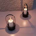 Elegant Decorative Ornament Set With Glass Lanterns And Lit Candles Against Gray Textured Wall