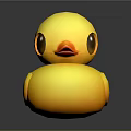 Bright Yellow Rubber Duck Toy With Large Eyes And Orange Beak On Black Surface