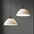 Two White Textured Dome Pendant Lights Softly Illuminating Gray Wall Interior 3d model